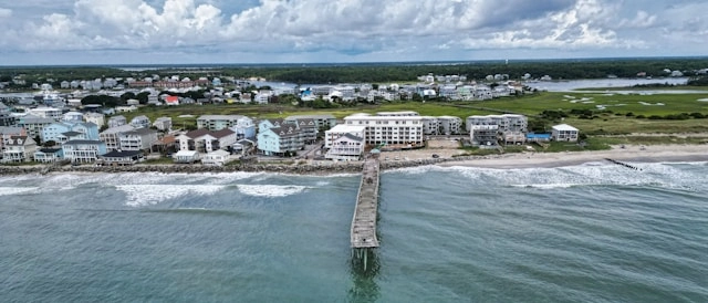 An overview of the beach at Carolina Beach, highlighting how close Atlantic Towers is to the beach