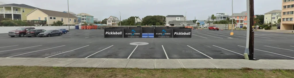 Concept image of the proposed Atlantic Towers pickleball court windscreen in the parking lot