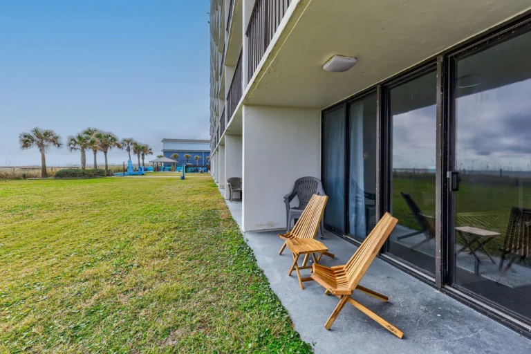 Ground-floor oceanfront patio outside Seagrass Retreat at Atlantic Towers